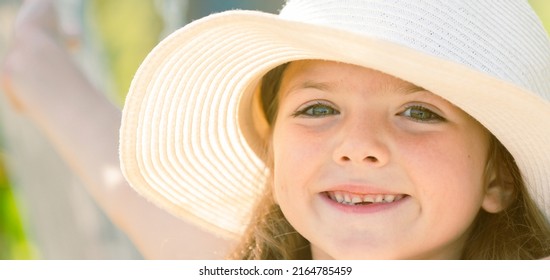 Happy Child Face Closeup. Child Teen Girl Has Summer Joy. Happy Day. Cute Playful Cheerful Kid With Funny Face. Happy Child Relax In Summer Green Background.