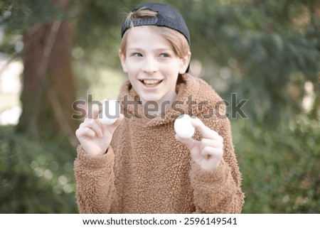 Happy Child Finding Hidden Easter Eggs