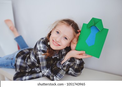 Happy Child Girl Making Greeting Card For Gift For Fathers Day. 