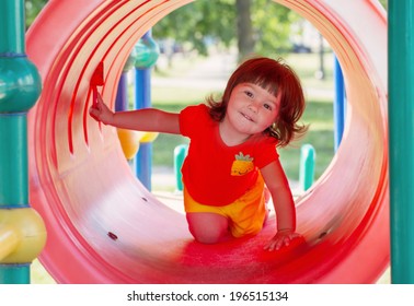 Happy Child On Playground