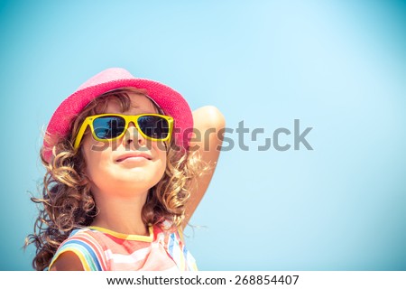 Happy child on summer vacation. Travel and adventure concept