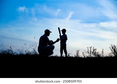 Happy child with parent playing baseball concept in park in nature - Powered by Shutterstock