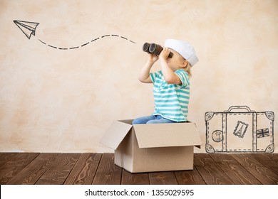 Happy Child Pretend To Be Sailor. Funny Kid Playing At Home. Summer Vacation And Travel Concept