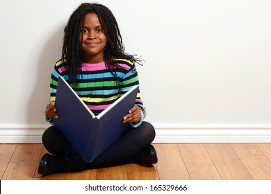 Happy Child Reading A Book