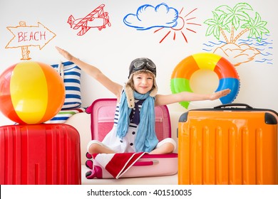 Happy Child Ready For A Summer Vacation. Kid Having Fun At Home