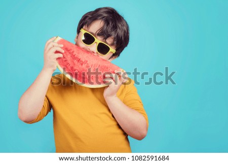 Similar – Glückliches Kind isst Wassermelone