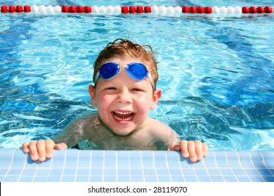 Happy Child In A Sunny Swimming Pool