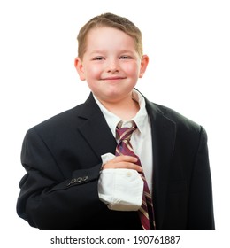 Happy Child Wearing Suit That Is Too Big For Him