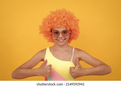 Happy Childhood. Birthday Party. Funny Kid In Curly Clown Wig. Having Fun. Child Wear Sunglasses