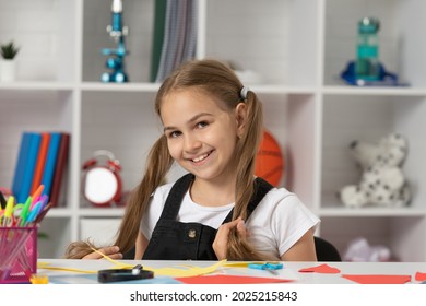 Happy Childhood. Cheerful Kid Going To Do Homework. Smiling Teenager Student Hold Pony Tails.