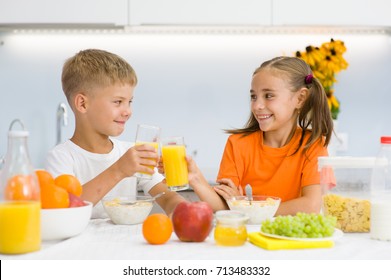 Happy Children Clink Glasses Orange Juice Stock Photo 713483332 ...