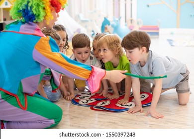 happy children and clown on birthday party - Powered by Shutterstock