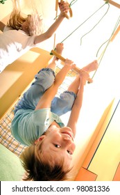 Happy Children Doing Sports Gymnastics At Home Gym