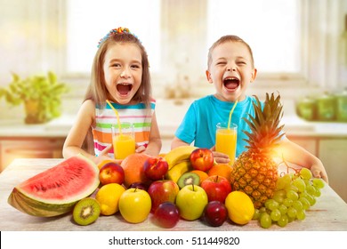 Happy Children With Fruits And Fresh Juice In Kitchen, Kids Healthy Eating Concept