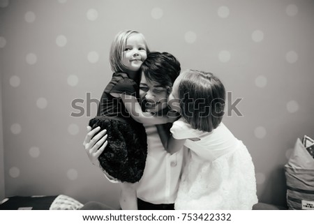 Similar – child girl playing checkers with her dad