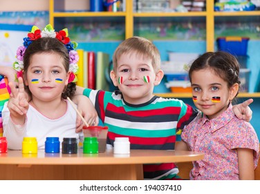 Happy children in language camp studying geography - Shutterstock ID 194037410