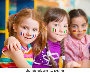 Happy Children In Language Camp Studying Geography