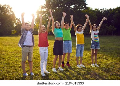 Happy Children Raise Their Hands Together Stock Photo 2194813333 ...