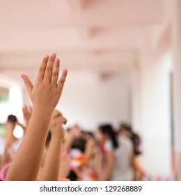 Happy Children With Their Hands Up