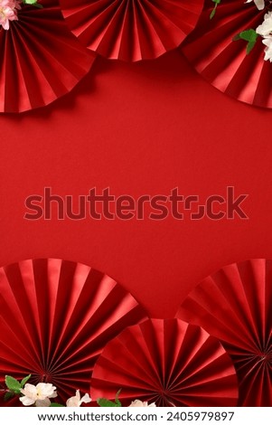 Happy Chinese new year 2024 vertical background with paper fans and sakura flowers