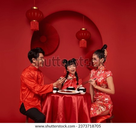 Happy Chinese new year. Asian family dinner food for prosperity celebration festival isolated on red decoration traditional festival background.