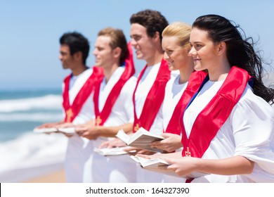 Happy Church Choir Singing On The Beach 