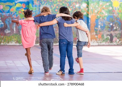 Happy Classroom Playing At School. Multi Ethnic Children, Back View.