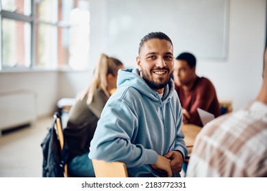 Happy College Student Having A Lecture In The Classroom And Looking At Camera.