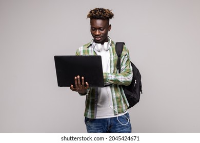 Happy College Student Holding Laptop, Isolated On White Background