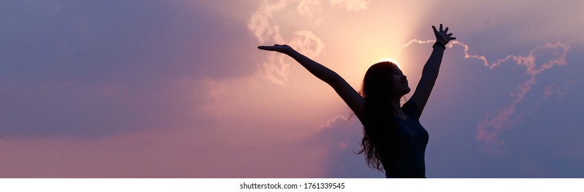 Happy confident Asian woman raising her hands up relax on summer vacation time, carefree girl being in nature, freedom people concept. - Shutterstock ID 1761339545