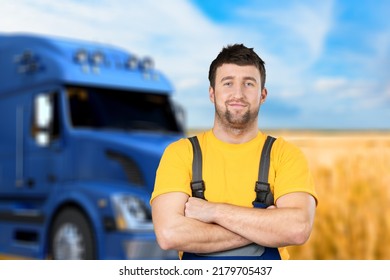 Happy Confident Male Driver Standing In Front On His Truck And Posing