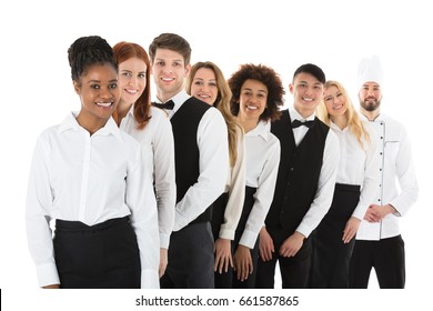 Happy Confident Restaurant Staff Standing In Row Against White Background