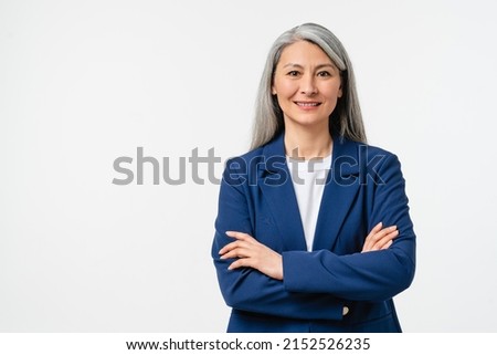 Happy confident smiling caucasian middle-aged mature businesswoman ceo manager employee in formal attire with arms crossed looking at camera isolated in white background.