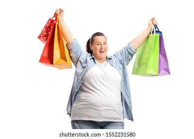 Happy corpulent  woman with shopping bags isolated on white background