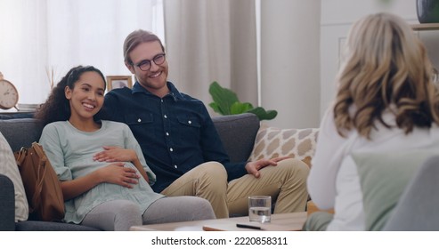 Happy, counseling and couple with a psychologist in an office for a therapy session together. Happiness, pregnant woman and her husband talking to a professional family therapist with a smile. - Powered by Shutterstock