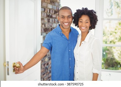 Happy Couple About To Open The Door Of Their House