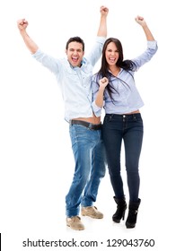 Happy Couple With Arms Up Celebrating - Isolated Over White