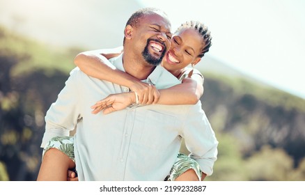 Happy, Couple And Black Woman Getting A Piggy Back Ride From African Husband On A Countryside Summer Vacation. Smile, Relax And Travel Outdoors On A Romantic, Love And Peaceful Nature Holiday Park