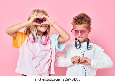 Happy Couple Child Wearing Headphones Posing Childhood Lifestyle Concept