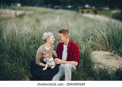 Happy Couple With Dog In Chicago