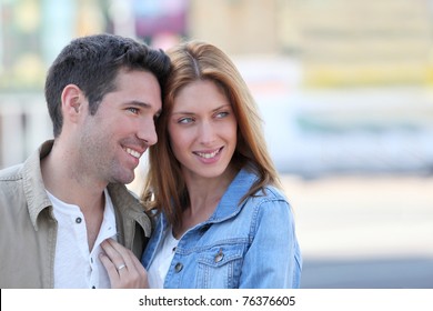 Happy Couple Doing Shopping In Town