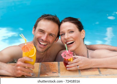 Happy Couple Drinking Cocktails