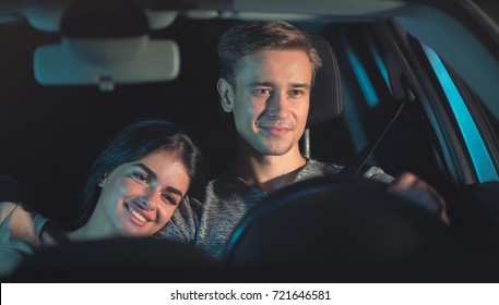 The Happy Couple Drive The Car. Evening Night Time