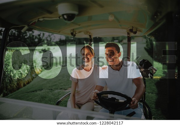Happy Couple is Driving Golf Car. Family on Golf\
Course. Man and Woman Play Golf. Lovers on Summer Weekend. Luxury\
Active Recreation. Family is Golfing. Elite Sports. Transparent\
Text Effect.