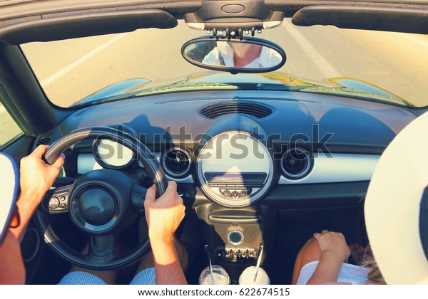 Happy Couple
Driving on Country Road  in
Car