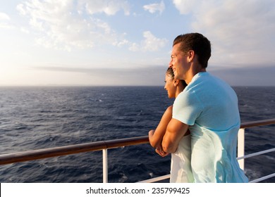 Happy Couple Enjoying Sea View In The Morning On A Cruise Ship