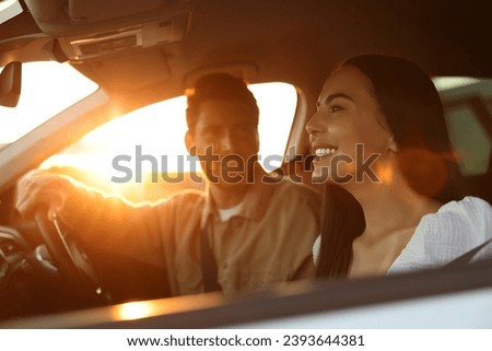 Happy couple enjoying trip together by car, selective focus