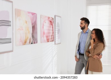 Happy couple at exhibition in art gallery - Shutterstock ID 2094357283
