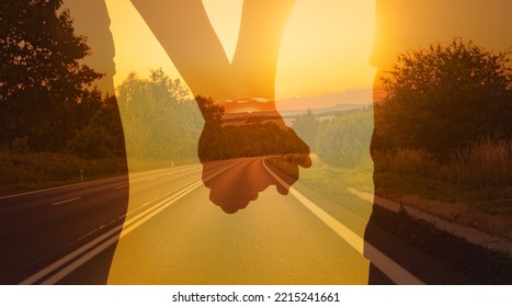 Happy couple facing country road.  People relationship future, travel, life journey concept.

 - Powered by Shutterstock