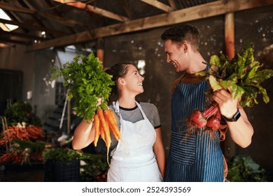 Happy couple, farming and carrots with vegetables for agriculture, harvest or fresh produce. Young farmer, man and woman with smile or food for organic production, natural growth or agro business - Powered by Shutterstock